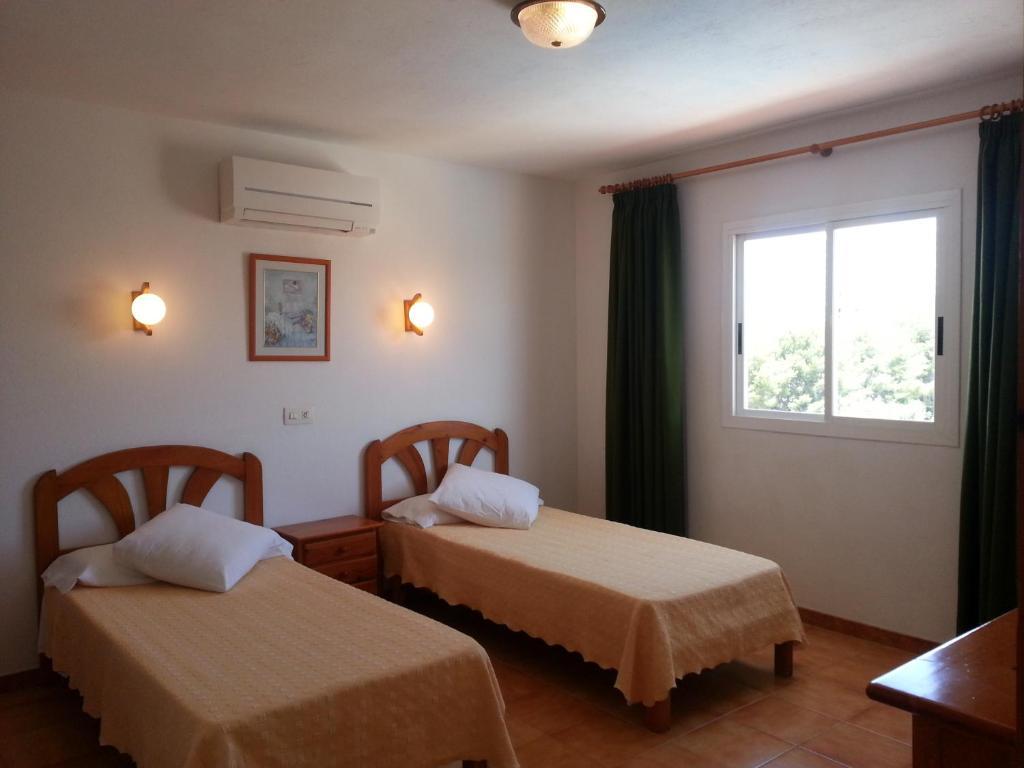 Apartamentos Vista Al Puerto San Antonio  Kamer foto